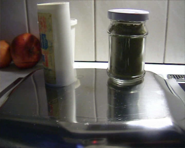 Photograph of our salt shaker on a very reflective surface